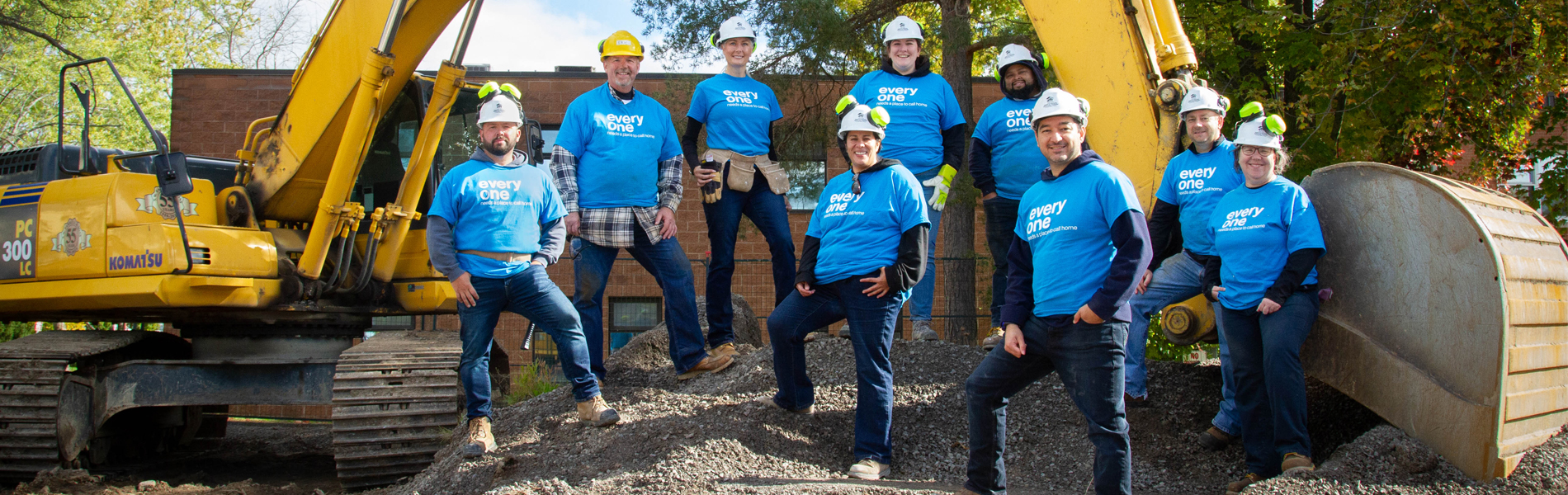 Habitat Build Day Team posing as a group on the Habitat build site.
